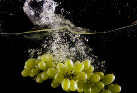 Splashing grapeの写真素材