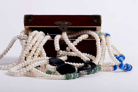 A wooden treasure chest filled with lootの写真素材