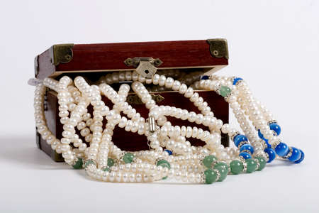 A wooden treasure chest filled with lootの写真素材