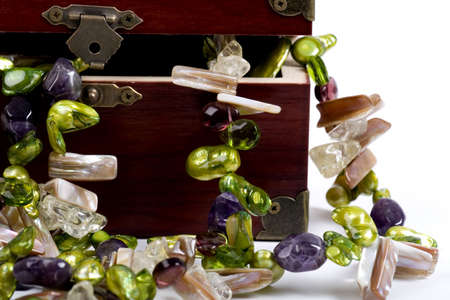 A wooden treasure chest filled with lootの写真素材