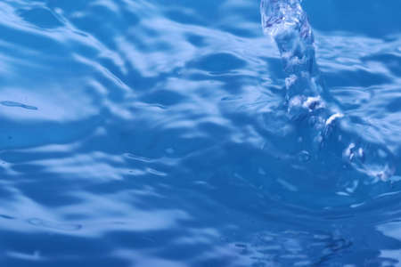 The abstract water splash backgroundの写真素材