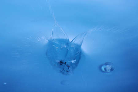 The abstract water splash backgroundの写真素材