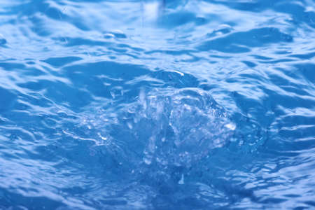 The abstract water splash backgroundの写真素材