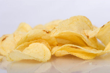Pile of potato chipsの写真素材