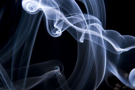 blue smoke on blackの写真素材