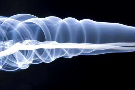 blue smoke on blackの写真素材