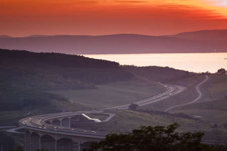 Cars speeding on a highwayの写真素材