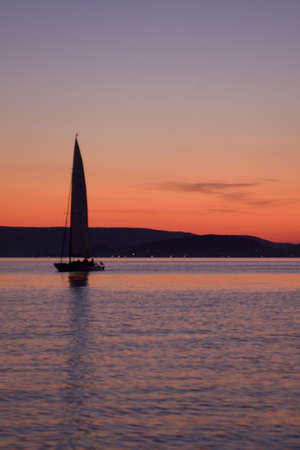 sailing and sunsetの写真素材