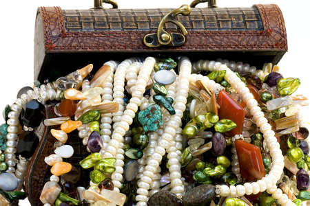 Chest full of jewelry treasures. Isolate on whiteの写真素材