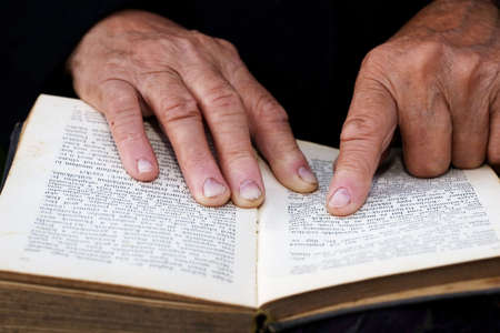 old hands and bibleの写真素材