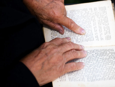 old hands and bibleの写真素材