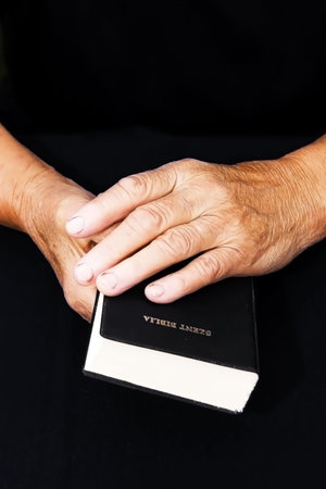 hands and bible