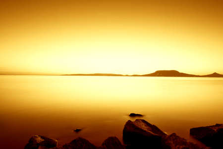 Beautiful sunset in the lake Balaton-long exposureの写真素材