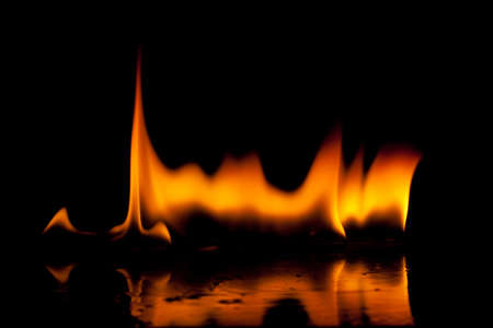 Close-up of fire and flames on a black backgroundの写真素材