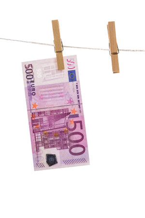 Euro money laundering on clothesline isolated on white background