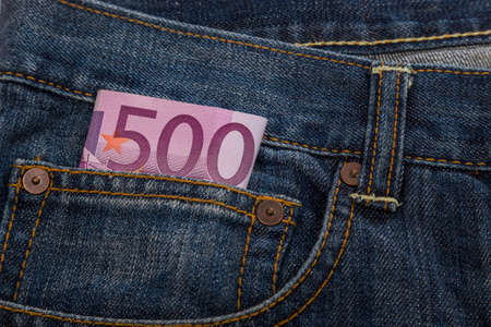 Euro banknotes in jeans back pocketの写真素材