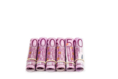 Rolled up Euro bills isoltaed backgroundの写真素材
