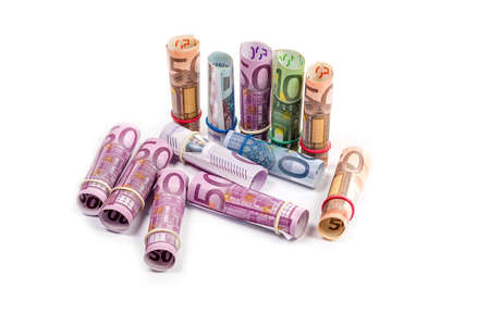 Rolled up Euro bills isoltaed backgroundの写真素材