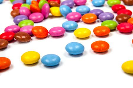 Close up of a pile of colorful chocolate coated candyの写真素材