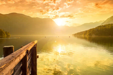 Sunset on the lake Bohinj  in Triglav national park, located in the Bohinj Valley of the Julian Alps.の写真素材