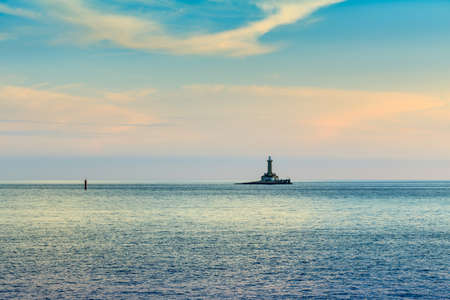 Lighthouse in stormy sea, Porer Rt Kamenjak Istra Croatiaの写真素材