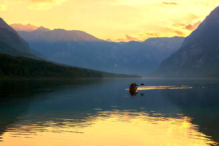 Sunset on the lake Bohinj in Triglav national park, located in the Bohinj Valley of the Julian Alps -Bohinj Lake, Slovenia - 27 July, 2014のeditorial素材