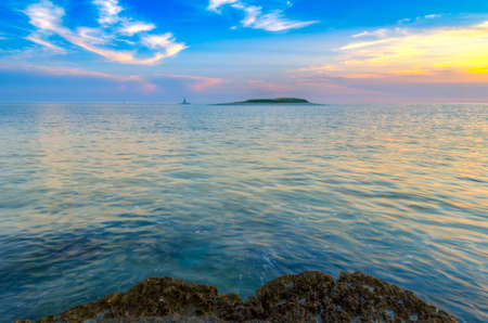 Lighthouse in stormy sea, Porer Rt Kamenjak Istra Croatia. This image make HDR techniqueの写真素材
