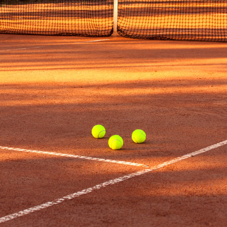 Tennis ball on a tennis clay  courtの写真素材