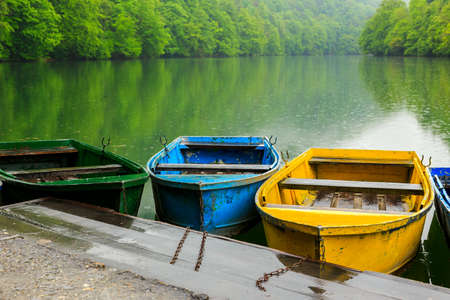 Boats at the lake Hamori near Lillafured in Hungaryの写真素材