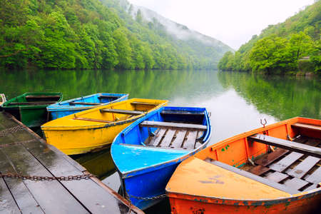 Boats at the lake Hamori near Lillafured in Hungaryの写真素材