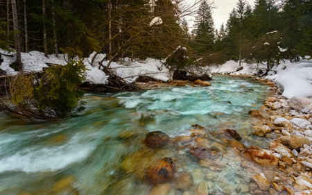 Mountain river in winter time in Julia Alps- Slovenia