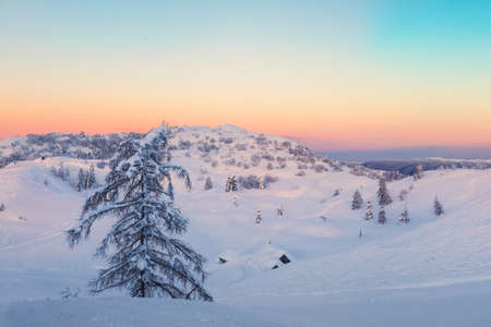 Magical sunset winter in Julian Alps mountains-Sloveniaの写真素材