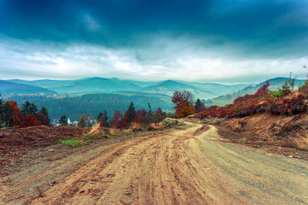 Colorful autumn road  landscape in the mountains in Transylvania, Romania.の写真素材