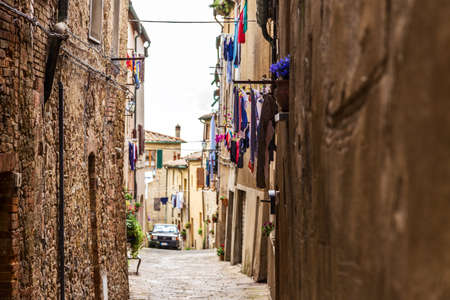 Street of the medieval village Volterra, province of Pisa, Tuscany, Italyの写真素材