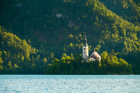 Bled with lake, island and mountains in background, Slovenia, Europeの写真素材