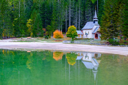 Little chapel at the Braies Lake ( Pragser Wildsee ) in Dolomites mountains, Sudtirol, Italyの写真素材