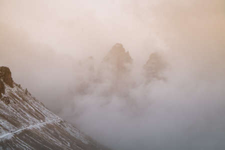 Snowy day, overcast skies on the Drei Zinnen Lavaredo, Dolomites Alps mountains, Italyの写真素材