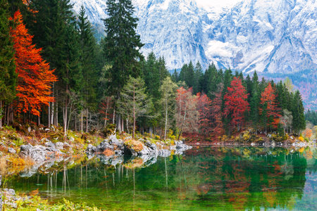 Autumn scenery at lake Fusine ( Lago di Fusine) mountain lake  in north Italy in the Alps.