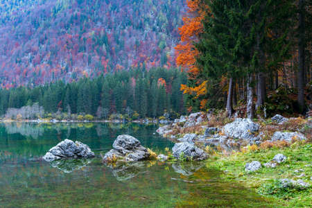 Autumn scenery at lake Fusine ( Lago di Fusine) mountain lake  in north Italy in the Alps.の写真素材