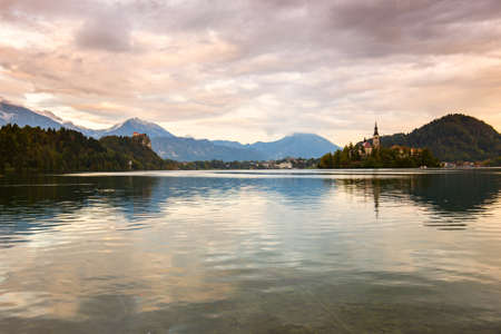 Lake Bled with St. Marys Church of the Assumption on the small island; Bled, Slovenia, Europe.の写真素材