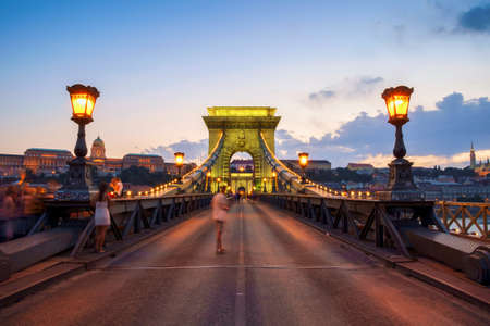 Szechenyi Chain Bridge ( Szechenyi Lanchid) by night in the city of Budapest, Hungary.の写真素材