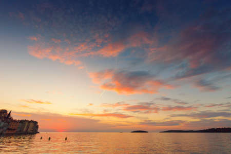 Beautiful sunset at Rovinj in Adriatic sea coast of Croatia, Europeの写真素材