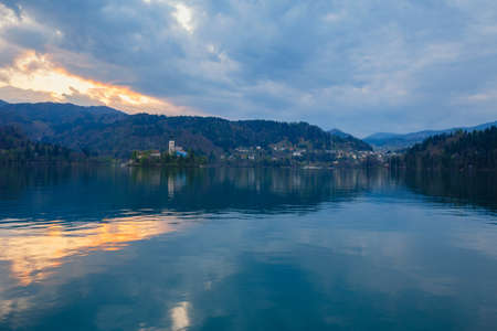 View of famous island and Church of Bled by night in Slovenia, Europeの写真素材