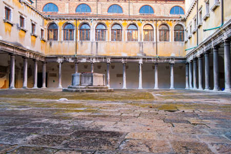 Interior on old brick house with columns in Venice, Italyの写真素材