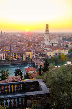 View of Verona city with Ponte Pietra and the river Adige at sunset.Italy.のeditorial素材