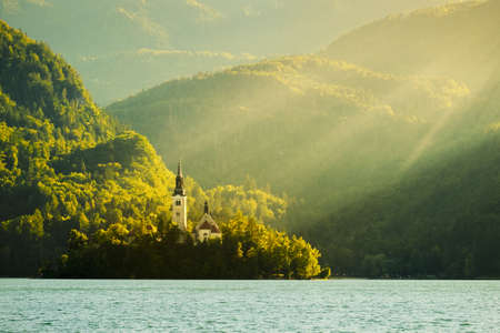Bled with lake, island, castle and mountains in background, Slovenia, Europeの写真素材