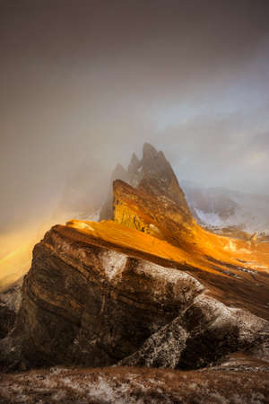 Seceda peak with clouds and amazing sunset, Odle mountain range,  Dolomites, Italyの写真素材