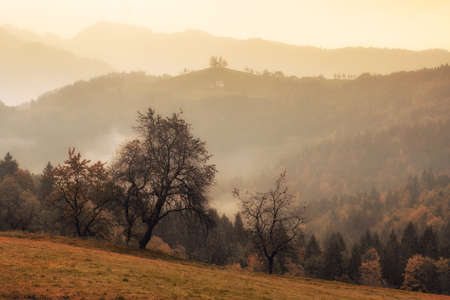 Autumn in Slovenia. Church of Sveti Tomaz on the top of the hill in central Slovenia.の写真素材
