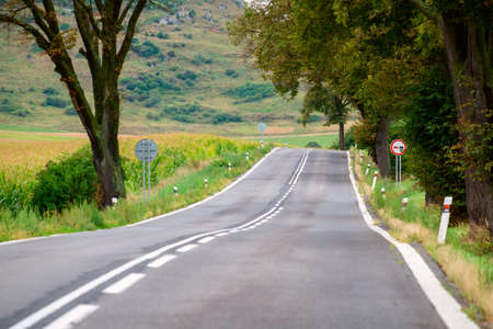 Autumn mountain road in a Tatra mountain in Slovakiaの写真素材