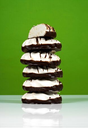 sweet dessert cakes marshmallows covered with chocolateの写真素材
